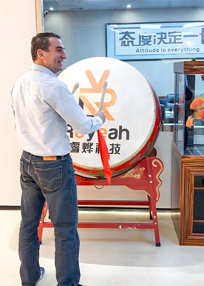 nayax ceo beating reyeah war drum action shot